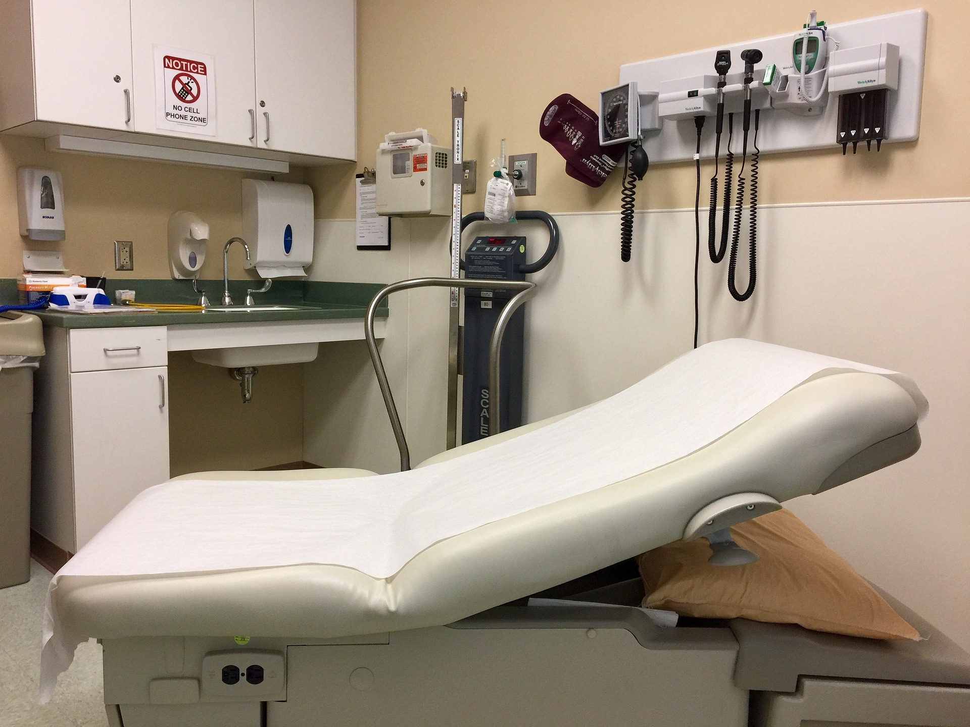 image of a doctors exam room and patient chair reclined. Should you go to the doctor? 9 signs you should visit your primary care physician when sick.